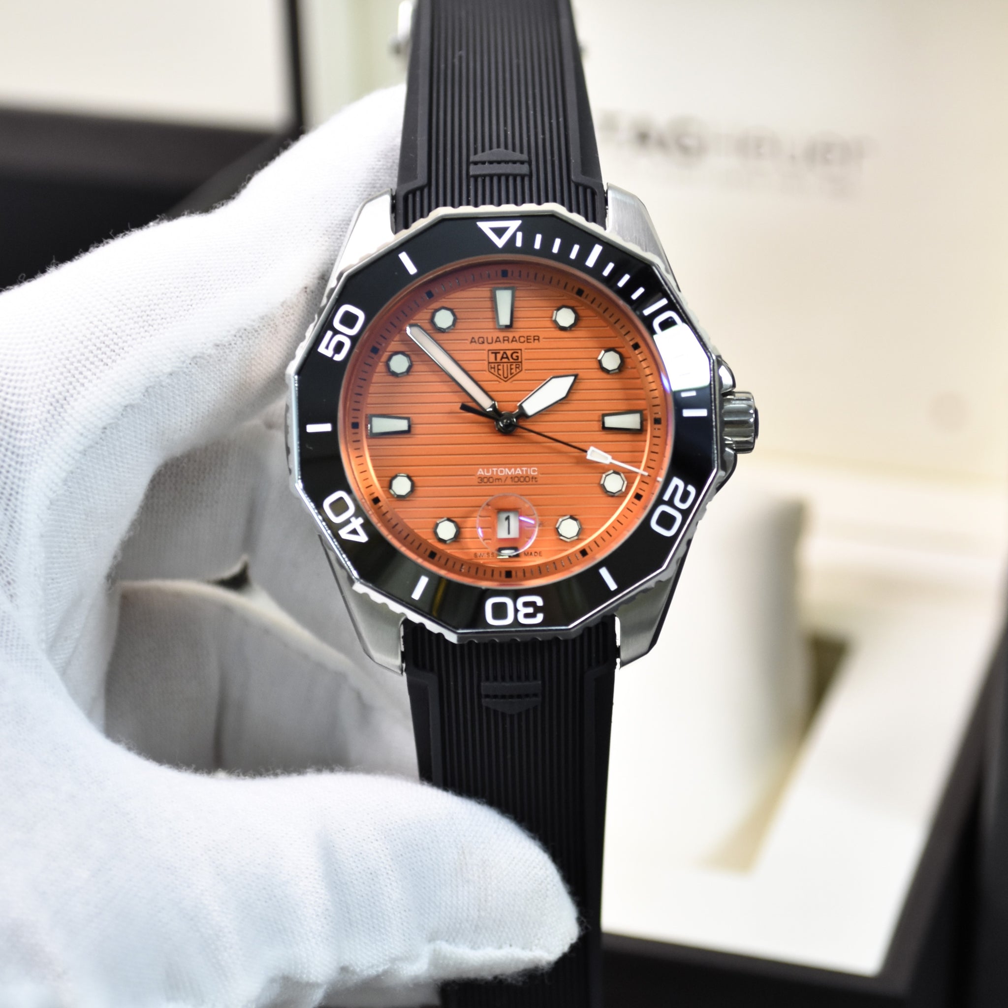 AQUARACER NEW MODEL AUTO ORANGE DAIL