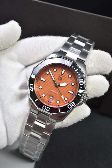 AQUARACER NEW MODEL AUTO ORANGE DAIL