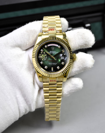 DAYDATE AUTO PRESIDENTIAL GOLD GREEN BLACK STONES